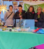 Die Grünen Binningen stehen am Weihnachtsmarkt 2025 hinter einem schönen Stand für eine grüne Zukunft ein